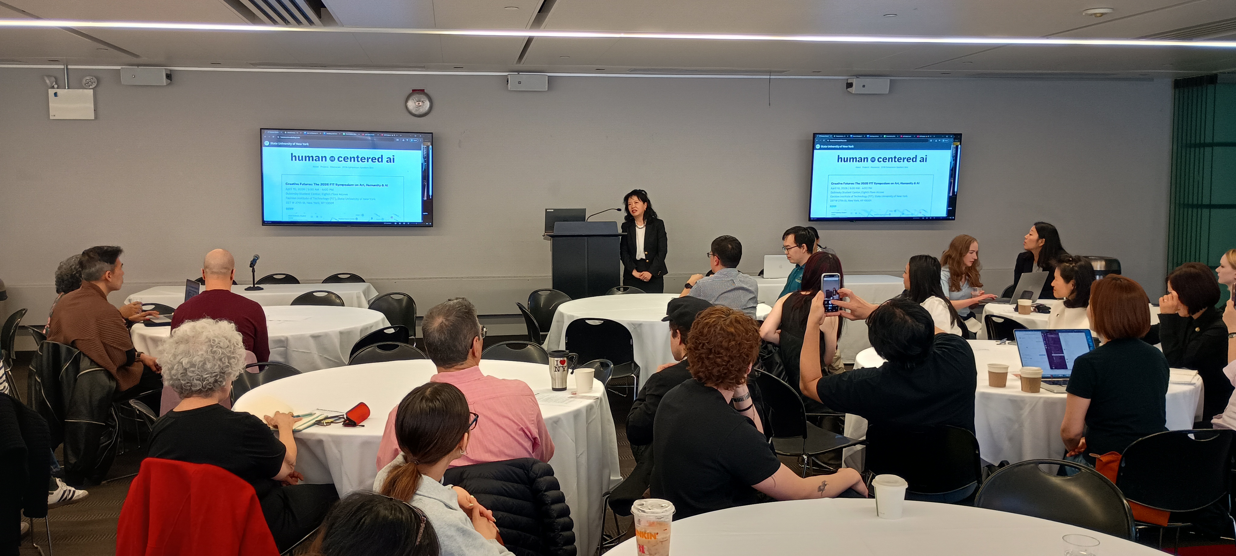 Attendees at symposium, Kyunghee Pyun Speaking