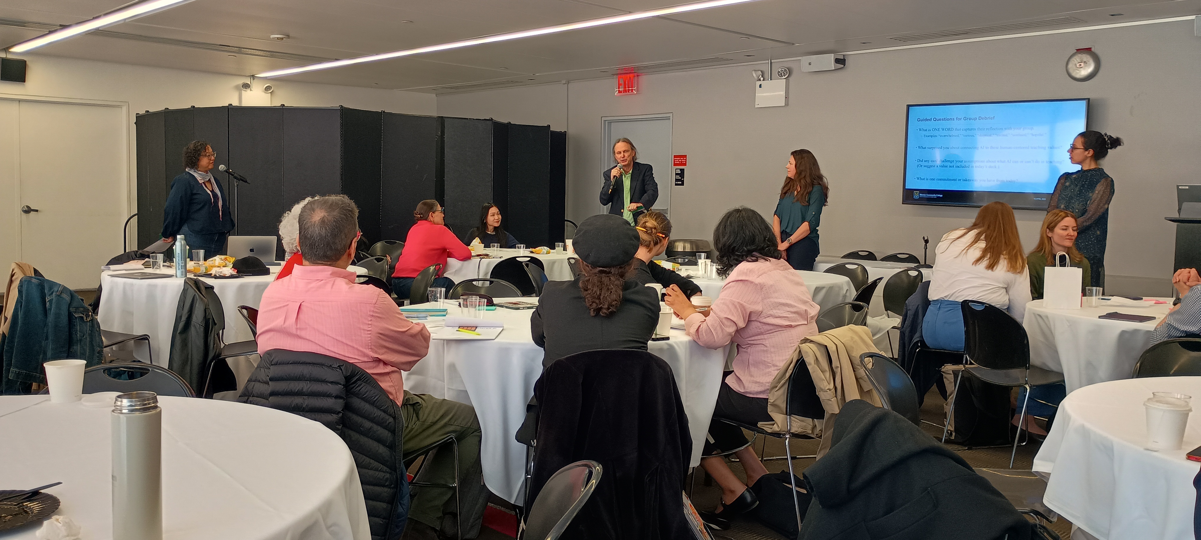 Attendees at symposium, Calvin Williamson Speaking